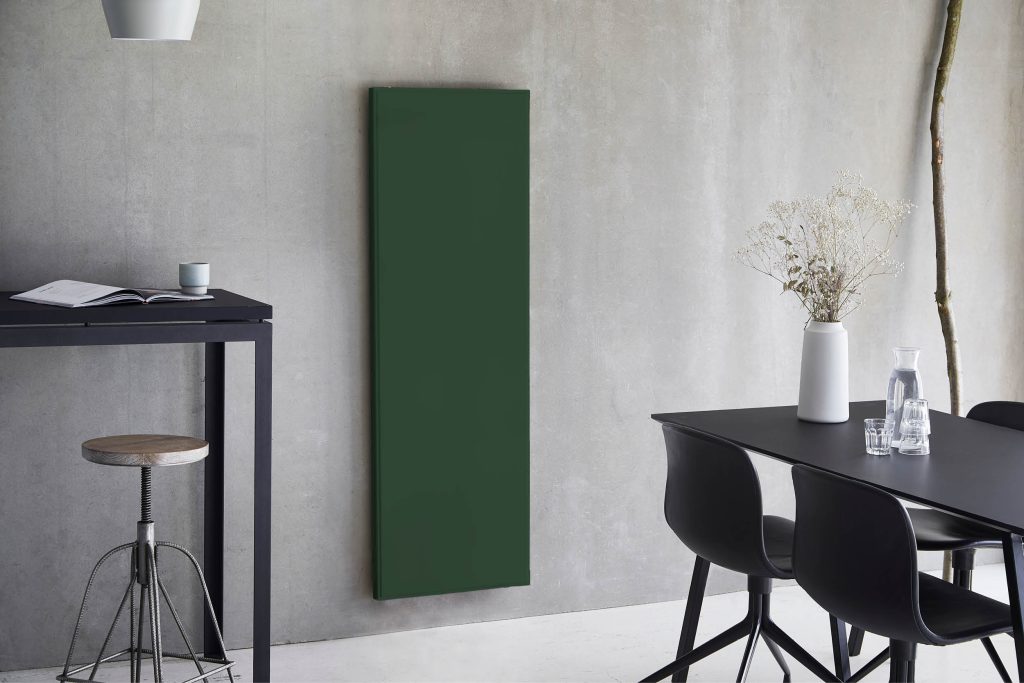 Green vertical radiator in a modern kitchen setting